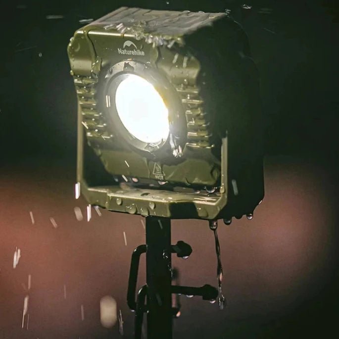 Portable Waterproof Floodlight: 1200 lumens, IPX4 waterproof, rechargeable with 3 color modes. Perfect for camping, hiking, and outdoor adventures.